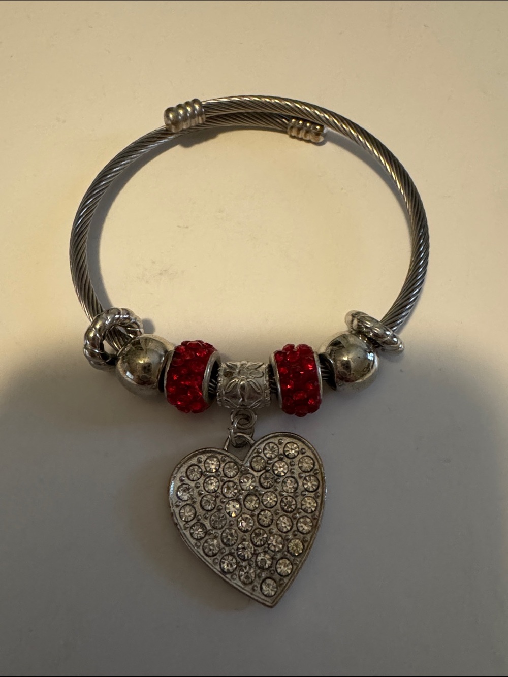 Silver-Tone Heart Charm Bracelet with Red Crystal Beads